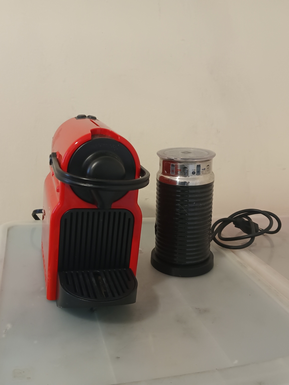 Nespresso Red and Black Espresso Machine with Black Milk Frother